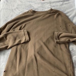 Army green sweatshirt with holes in it!